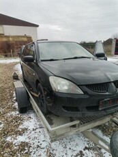 Mitsubishi lancer 2.0 dohc benzyynna