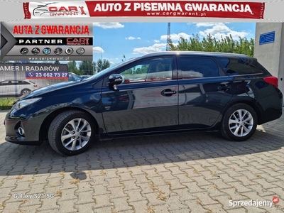 Toyota Auris II HYBRYDA 1.8 99 KM szklany dach navi jasne skóry gwarancja