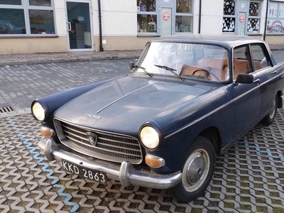 Peugeot 404 ubezpieczonny jeżdżący