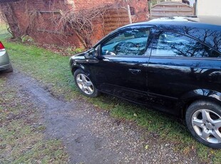 Opel Astra GTC długie oplaty