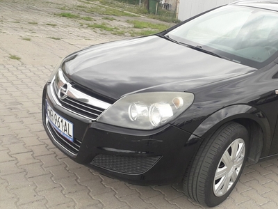 Opel Astra J Sports Tourer 1.6 Twinport ECOTEC 115KM 2011