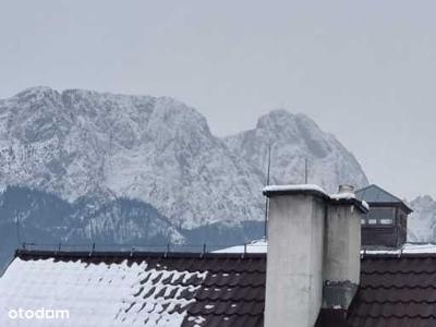 Mieszkanie przy Krupówkach z widokiem na Giewont