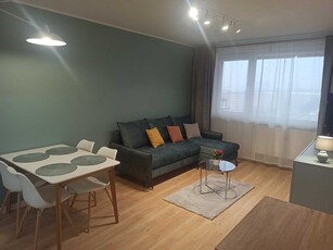 Atrakcyjny apartament blisko morza z miejscem postojowym