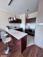 Apartament z garażem w centrum w otoczeniu zieleni