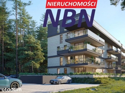 Dwupoziomowy apartament z garażem i balkonem