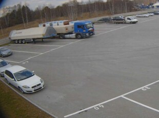 Plac 10 000m², parking, utwardzony, ogrodzony, doskonała lokalizacja.