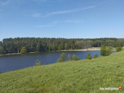 Działka nad jeziorem z linią brzegową Rudzienice, poj. Iławskie.